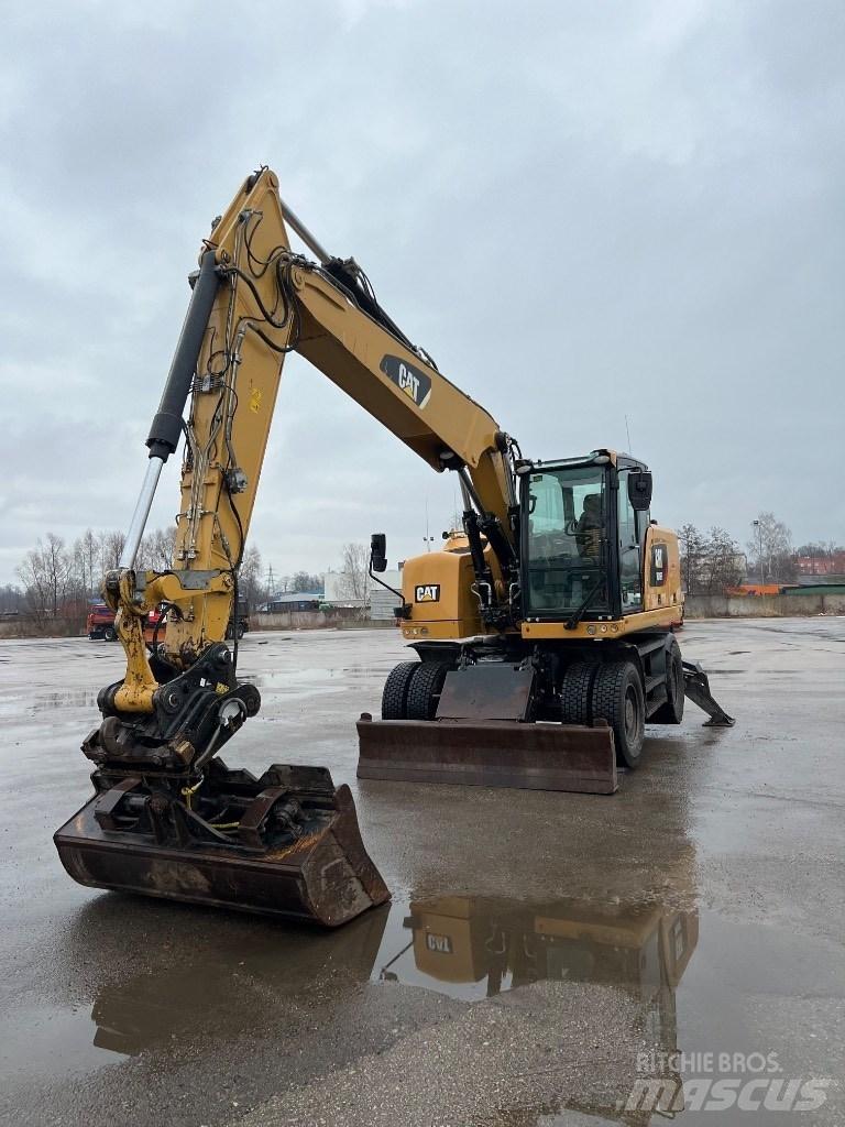 CAT M 316 F Pelle sur pneus