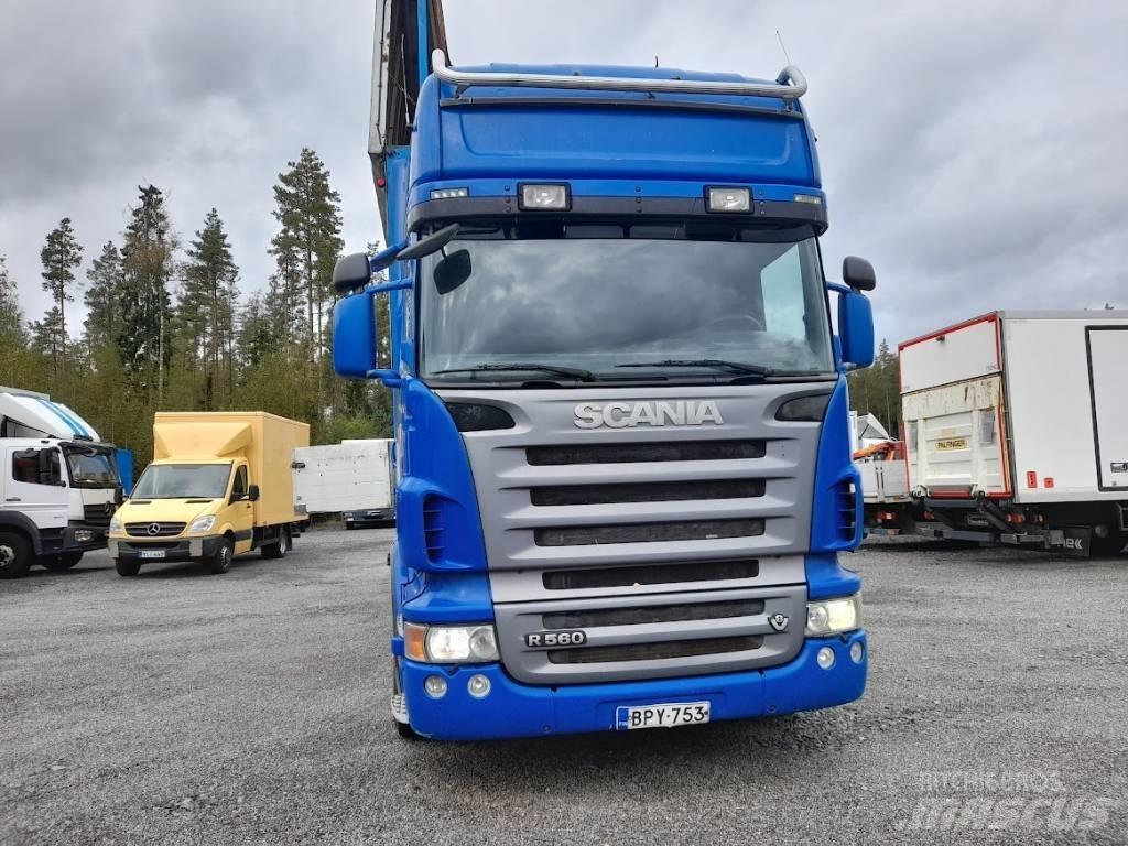 Scania R 560 Camion plateau ridelle avec grue