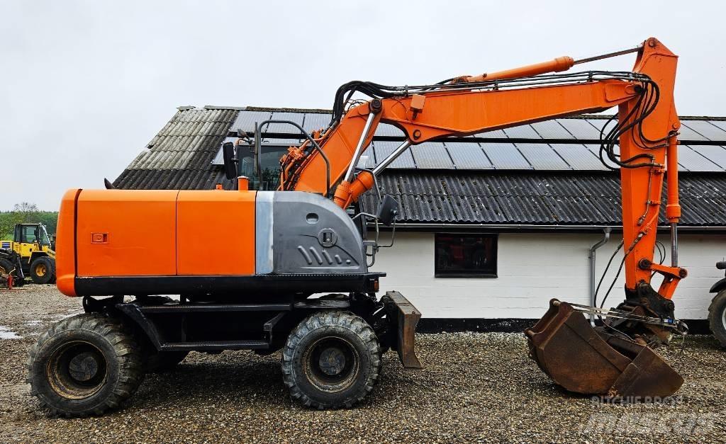Hitachi ZX 140 W-3 Pelle sur pneus