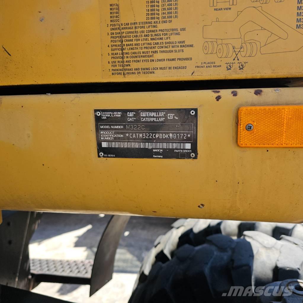 CAT 322 C Pelle sur pneus