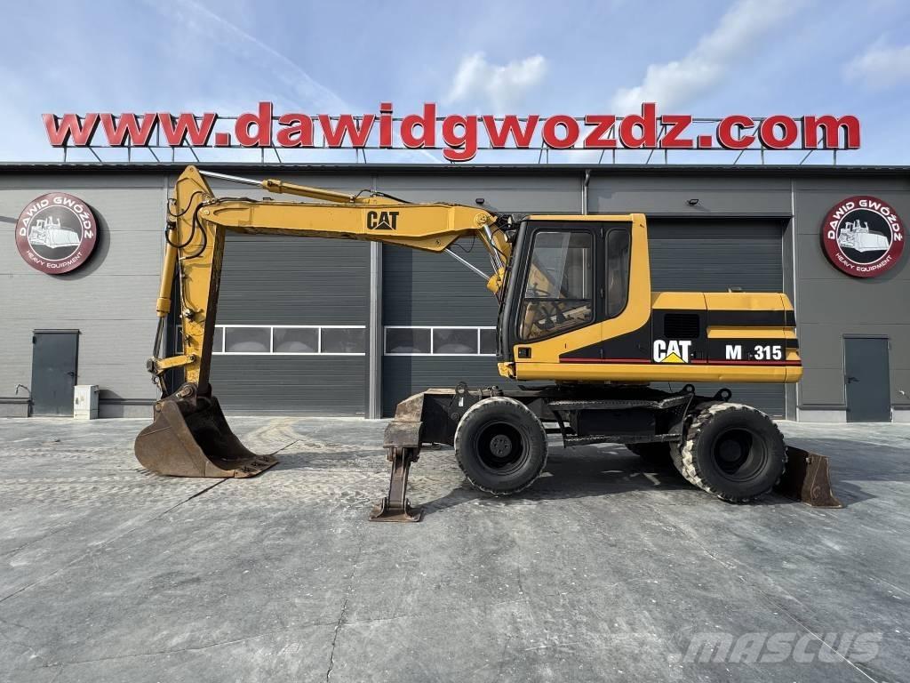 CAT M 315 Pelle sur pneus