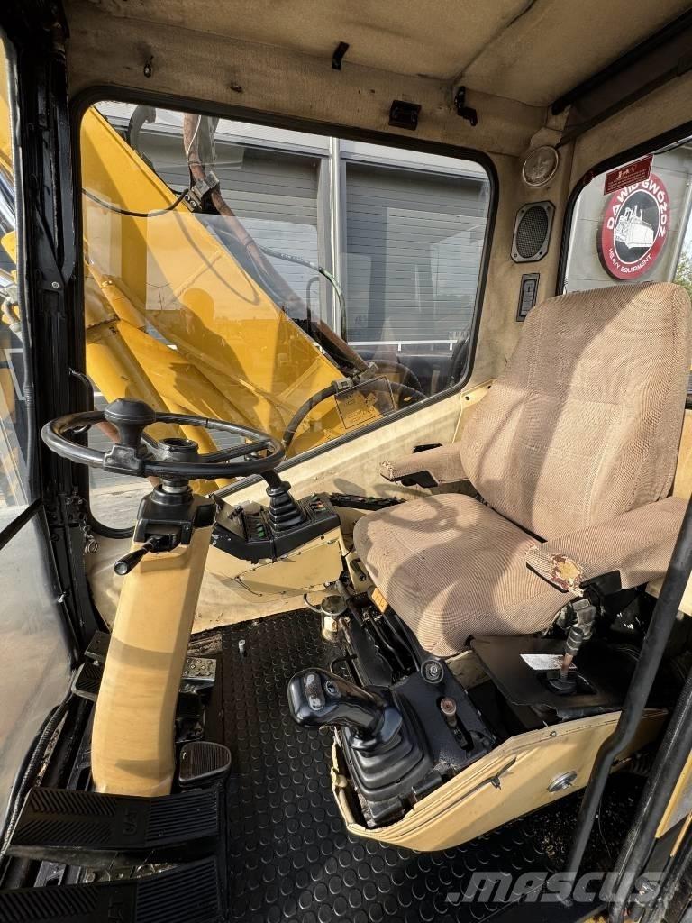 CAT M 315 Pelle sur pneus