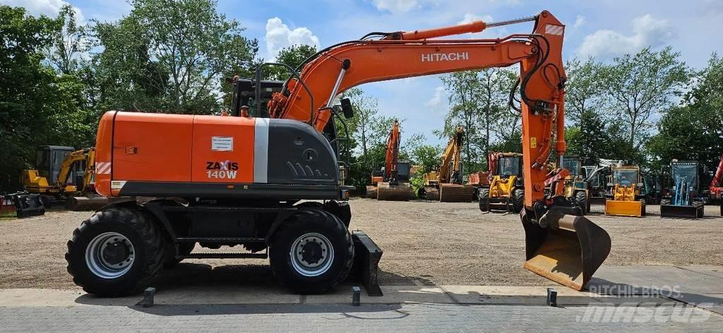 Hitachi ZX140-3 Pelle sur pneus