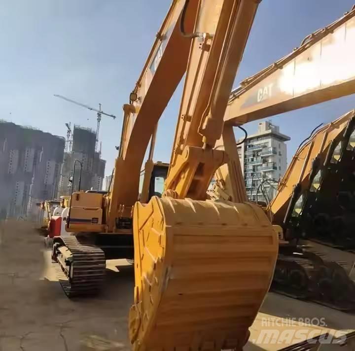 CAT CAT323B Mini pelle 7t-12t