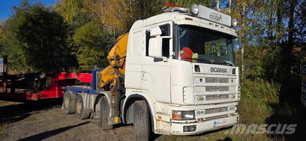 Scania R 144 G Camion plateau ridelle avec grue