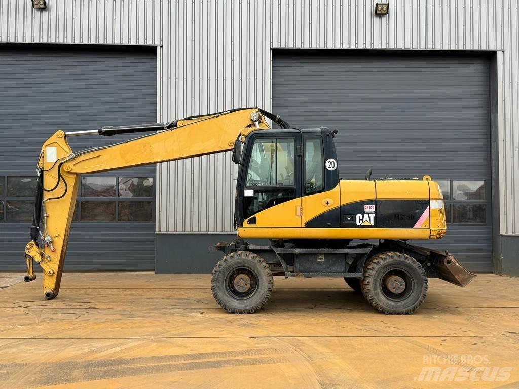 CAT M315D Pelle sur pneus