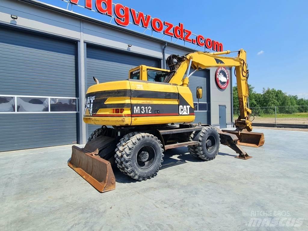 CAT M 312 Pelle sur pneus