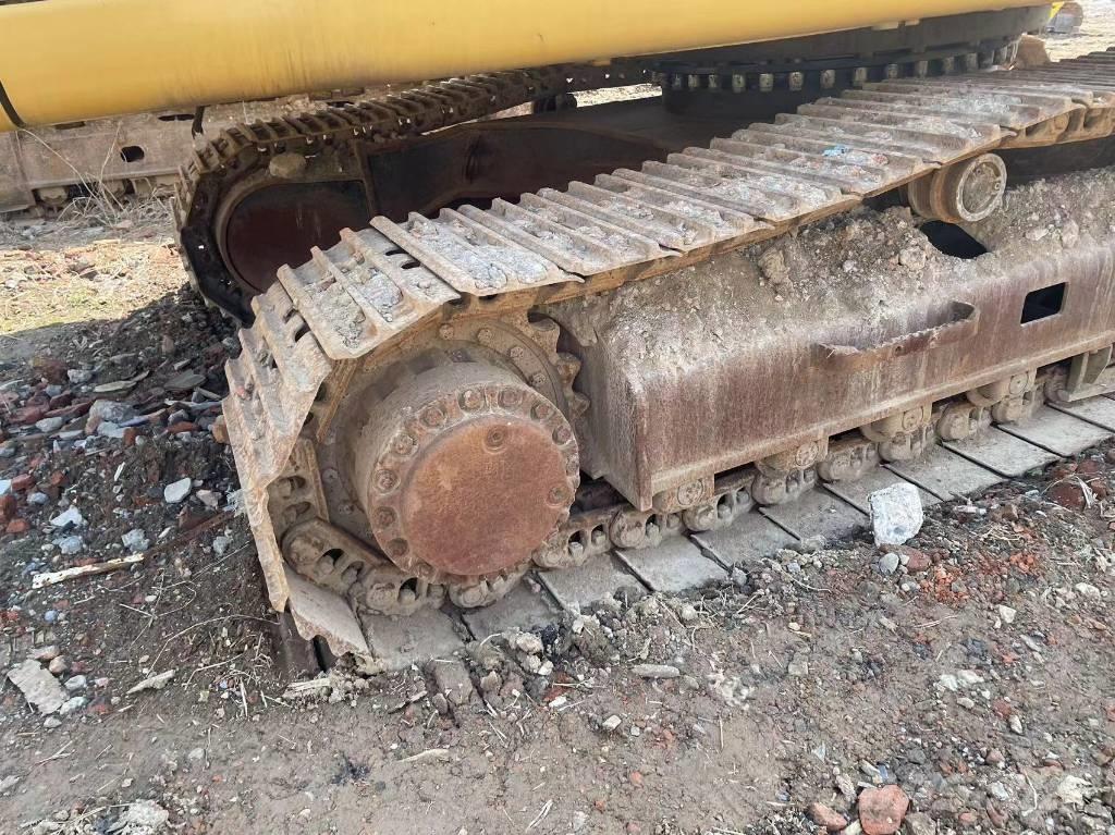 CAT 329D Pelle longue portée