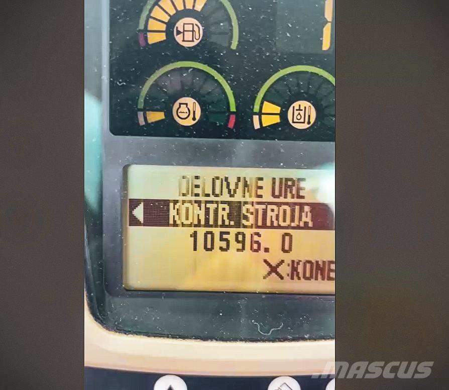 CAT M 313 C Pelle sur pneus