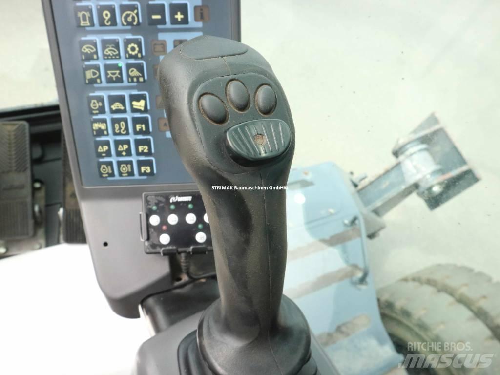 Atlas 180 MH Pelle sur pneus