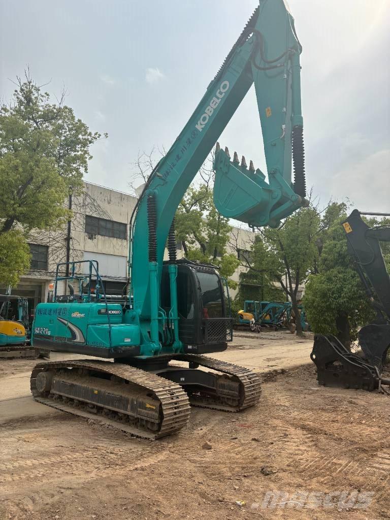 Kobelco SK210 Pelle sur chenilles