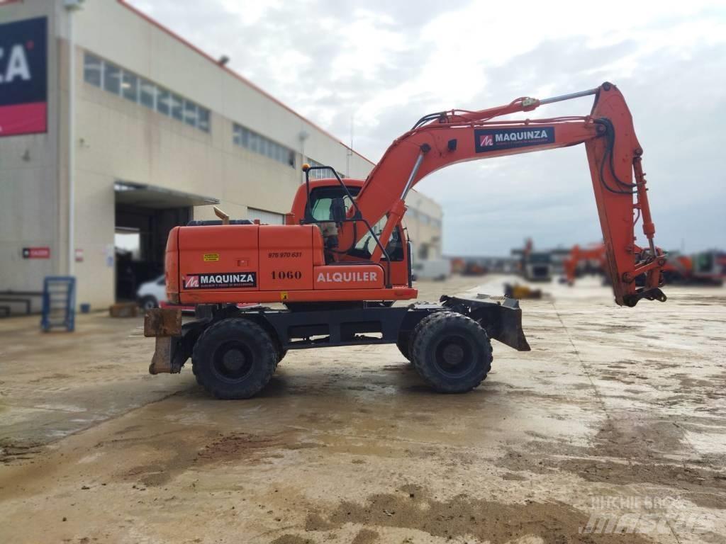 Doosan DX 140 W Pelle sur pneus