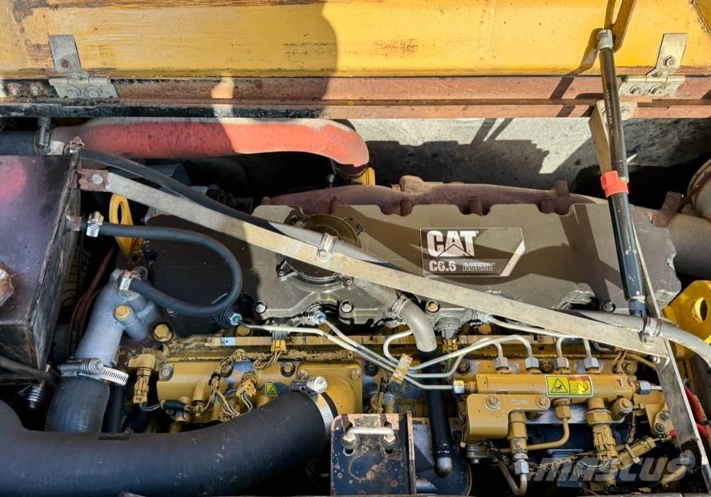 CAT M 318 D Pelle sur pneus