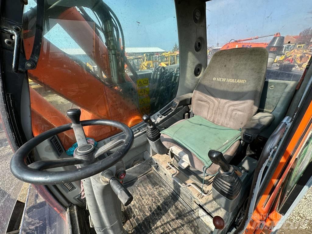 New Holland MH Plus Pelle sur pneus