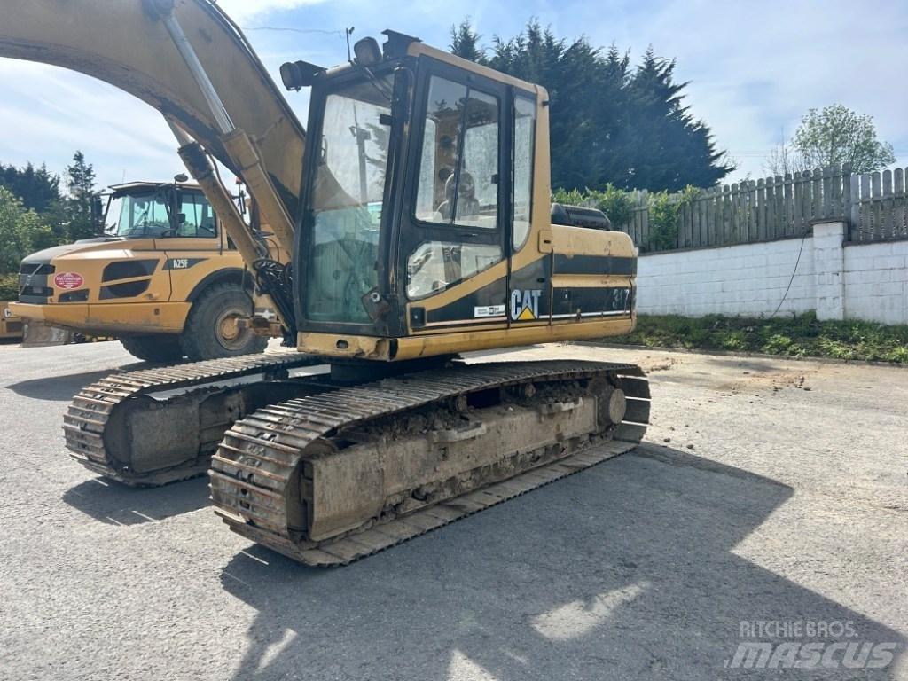 CAT 317 Pelle sur chenilles