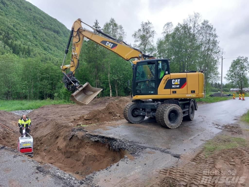 CAT M 314 F Pelle sur pneus
