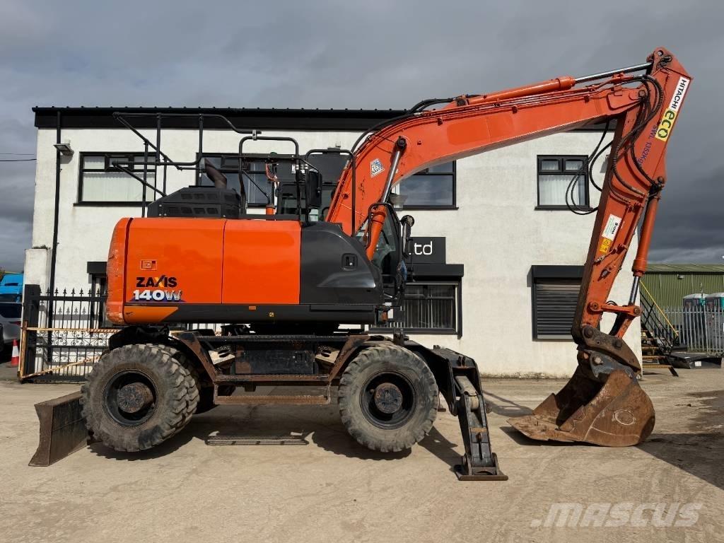 Hitachi ZX 140 W-6 Pelle sur pneus