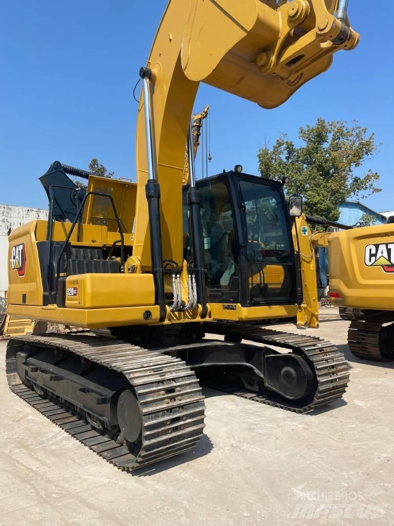 CAT 320 GC Pelle sur pneus