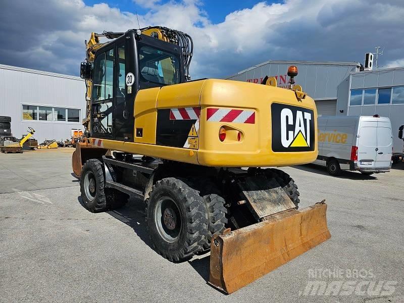 CAT M 315 D Pelle sur pneus
