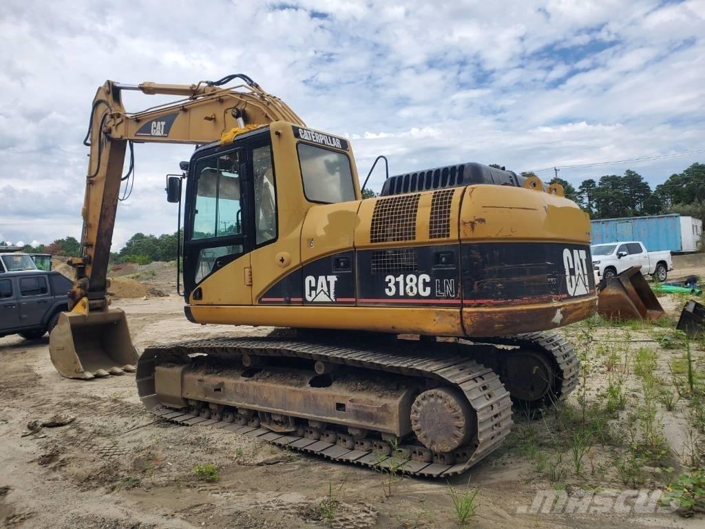 CAT 318 C LN Pelle sur chenilles