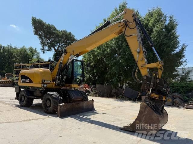 CAT M 316 D VAH Pelle sur pneus
