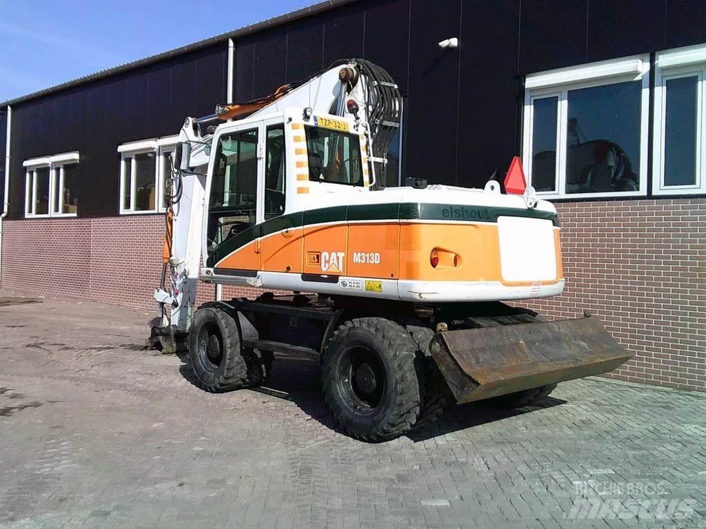 CAT M313D Pelle sur pneus