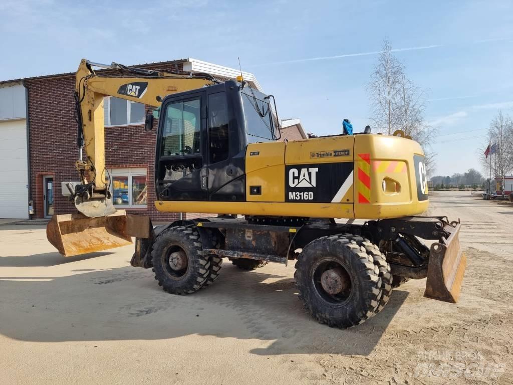 CAT M316 D II Pelle sur pneus