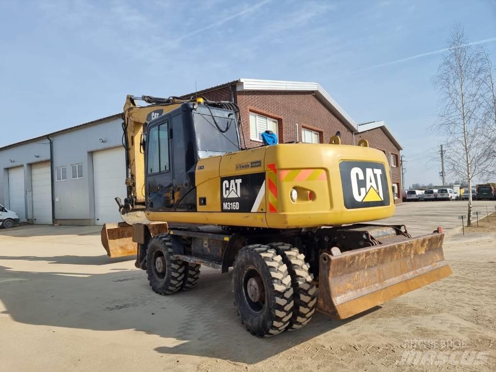 CAT M316 D II Pelle sur pneus