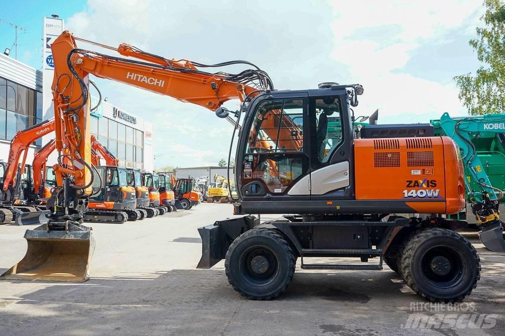 Hitachi ZX 140 W-6 Pelle sur pneus