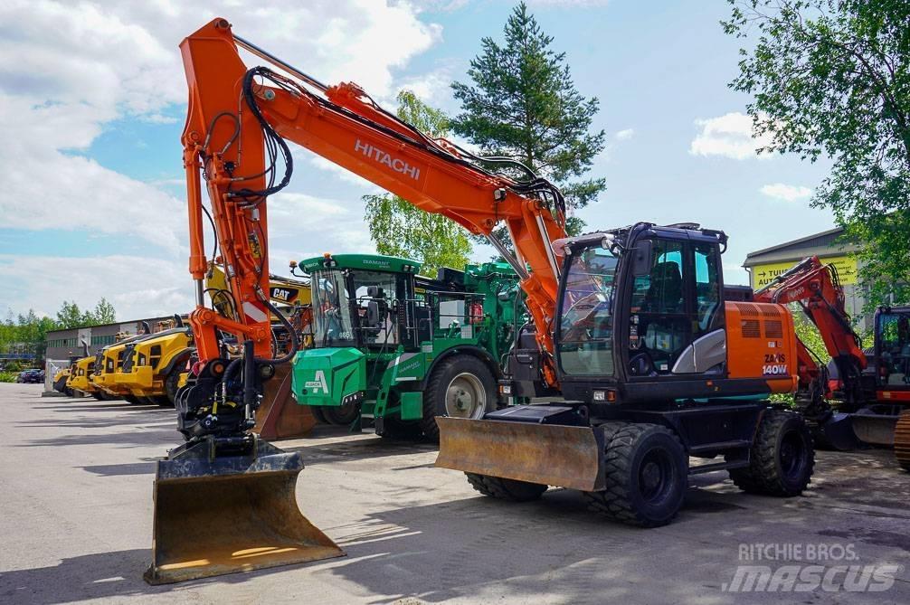 Hitachi ZX 140 W-6 Pelle sur pneus