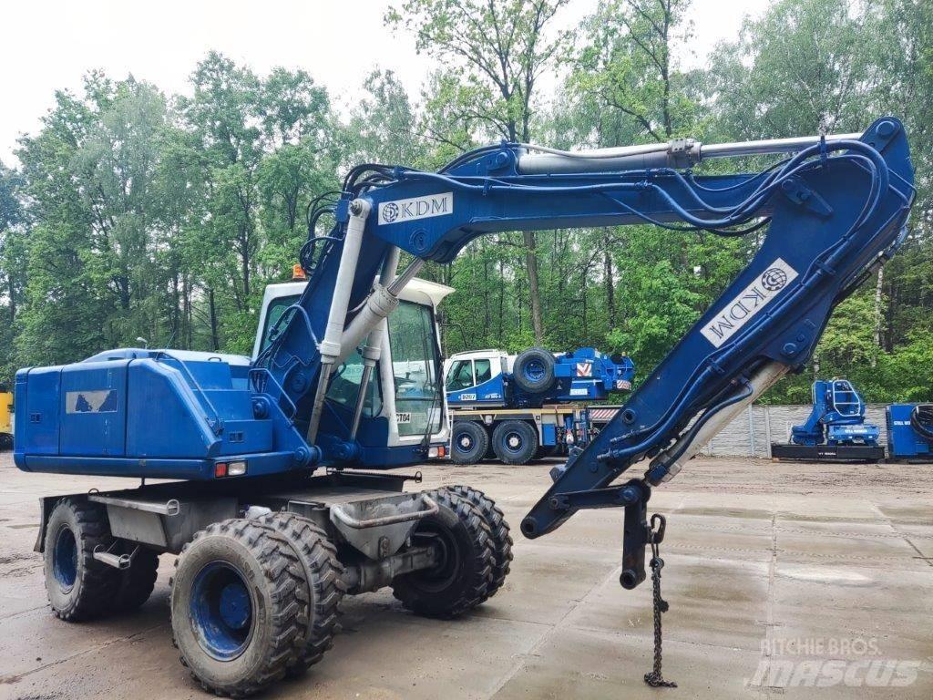 Atlas 1404 Pelle sur pneus