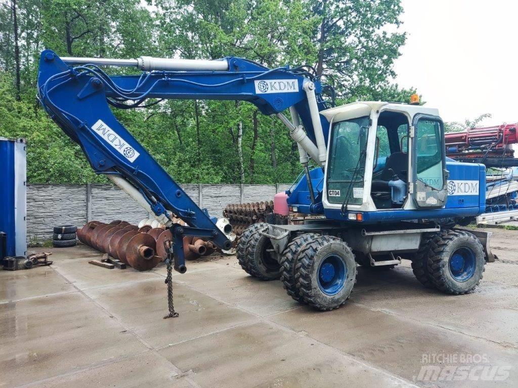 Atlas 1404 Pelle sur pneus