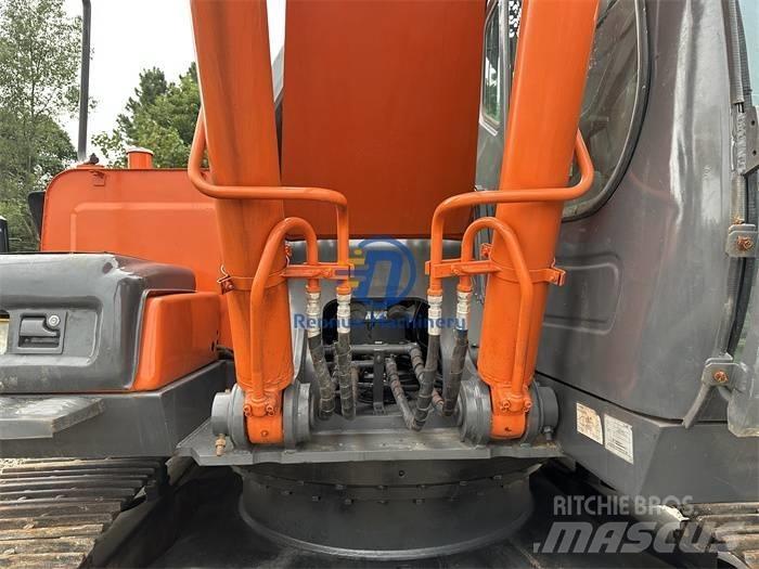 Hitachi ZX 240G Pelle sur chenilles