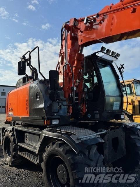 Hitachi ZX 140 W-6 Pelle sur pneus