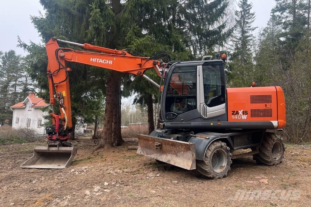 Hitachi ZX 140 W-3 Pelle sur pneus