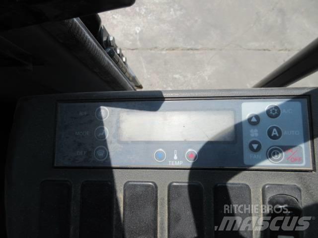 New Holland E 245 Pelle sur chenilles