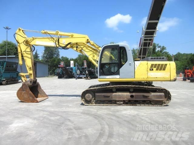 New Holland E 245 Pelle sur chenilles