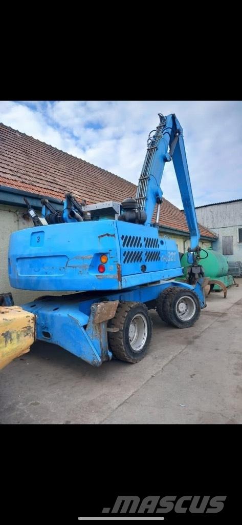 Fuchs MHL 320 Pelle sur pneus