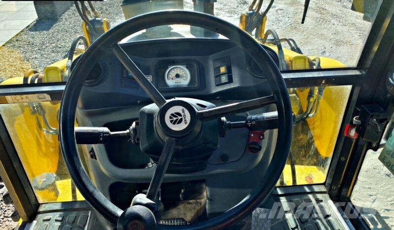 New Holland B 115 Tractopelle