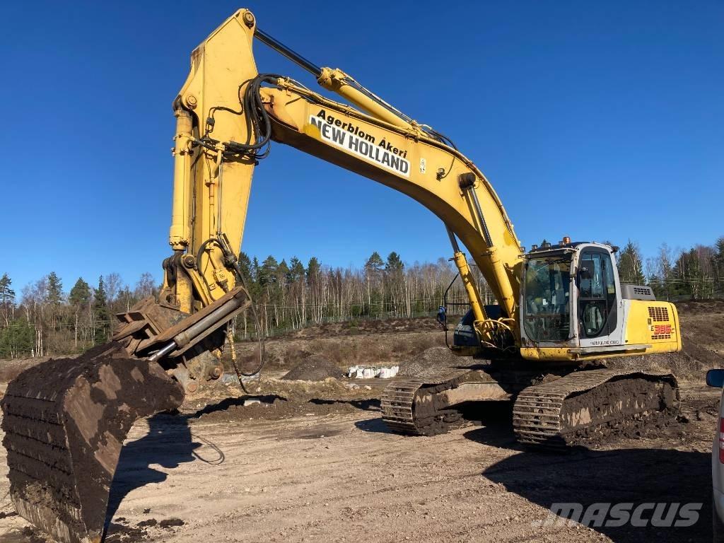 New Holland E 385 Pelle sur chenilles