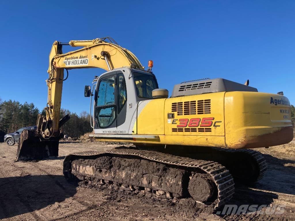 New Holland E 385 Pelle sur chenilles