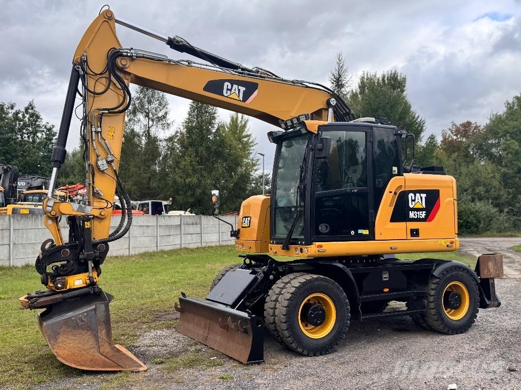 CAT M315F Pelle sur pneus