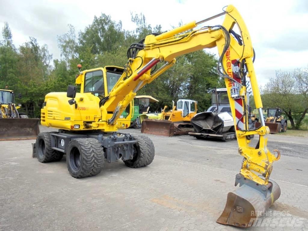Takeuchi TB 295 W-2 Pelle sur pneus