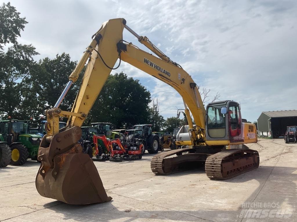New Holland E 305 Pelle sur chenilles