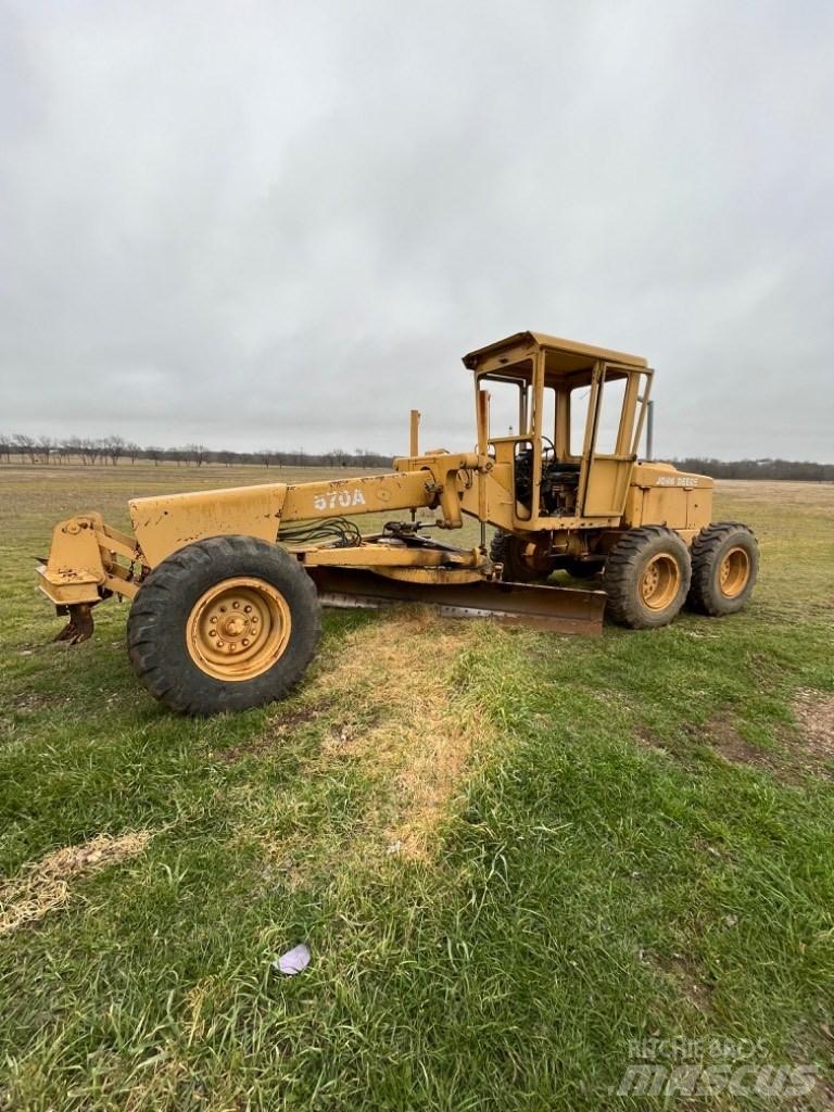 DEERE 570A Niveleuse