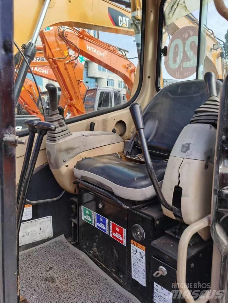 CAT 303 Mini pelle < 7t