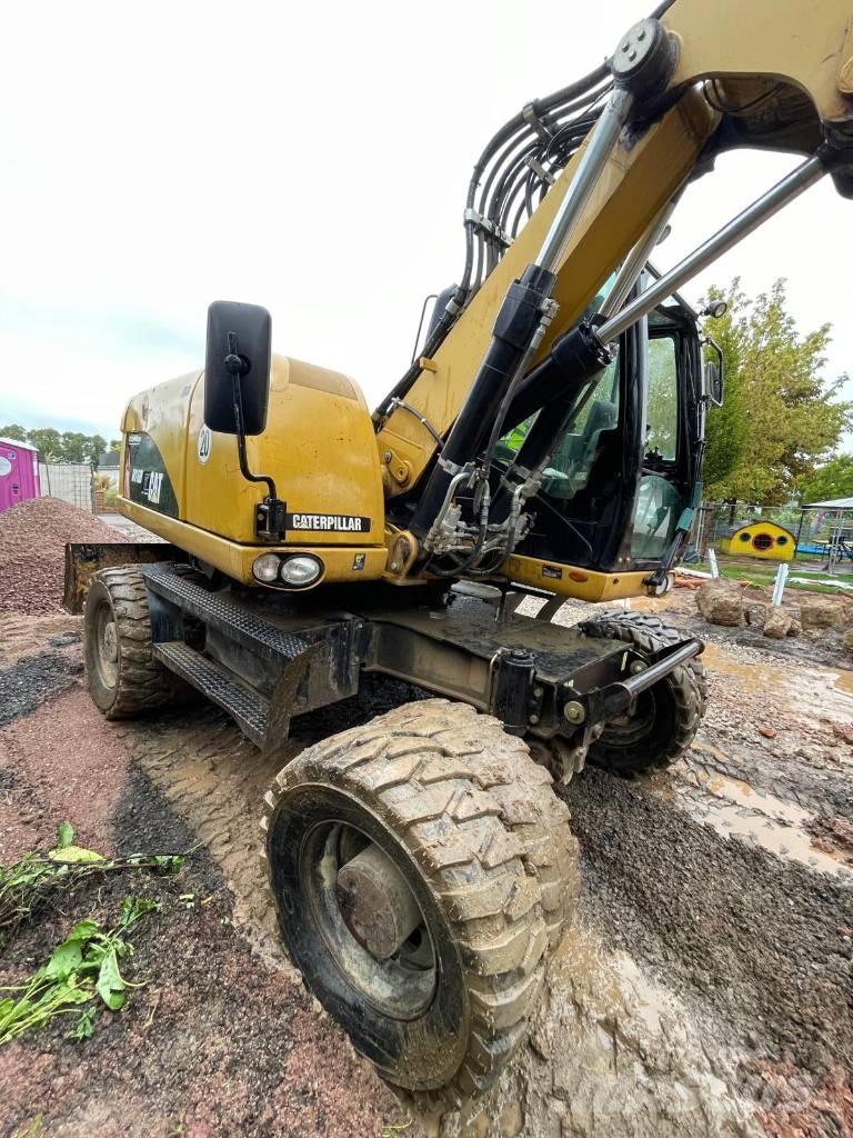 CAT 316 D Pelle sur pneus