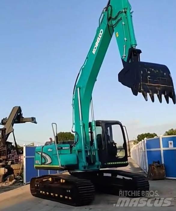 Kobelco SK 210 Pelle sur chenilles