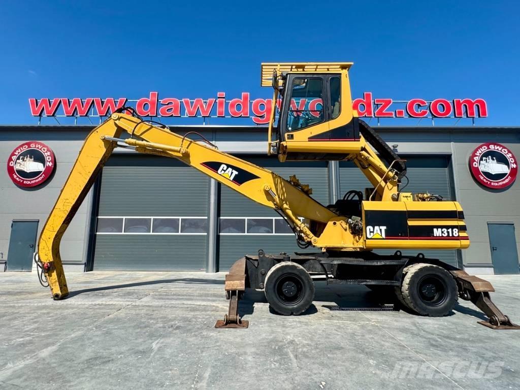 CAT M 318 MH Pelle sur pneus