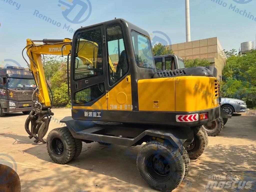Xinyuan XYB75 Pelle sur pneus